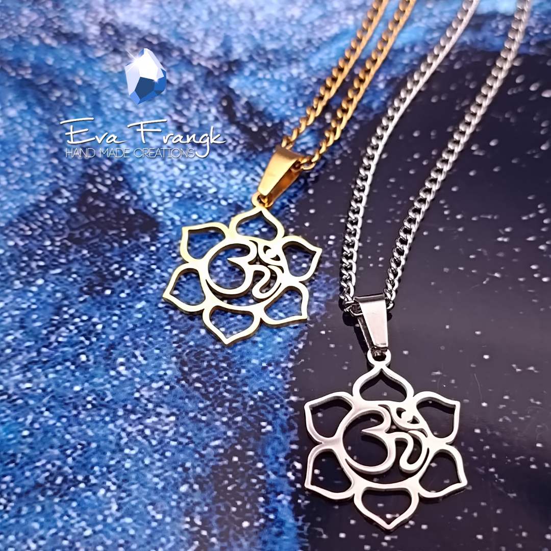 40 Λωτός με ιερό OM. Αυτό το μενταγιόν συμβολίζει την αναγέννηση και την άνοδο. Το ιερό μάντρα της ισορροπίας ΟΜ βρίσκεται στο κέντρο του λωτού. Χάρισε αυτό το ενεργειακό φυλαχτό στον εαυτό σου ή σε έναν αγαπημένο σου άνθρωπο και μετέφερε το μήνυμα της εξέλιξης και της ανάπτυξης. eva frangk